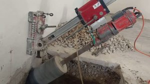 Алмазное сверление отверстий диаметром 200мм. Под Углом 45 градусов.