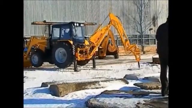 ДЭМ 114 экскаватор погрузчик с гидромолотом ДОРЭЛЕКТРОМАШ смотреть онлайн