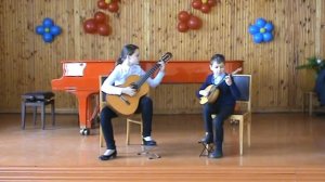 Дуэт: Виктория Погоря (13 лет, гитара) и Илья Галочкин (11 лет, домра)