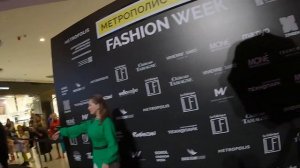 Репортажная фотография с октобоксом на показе мод