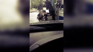 Девушка на большом мотоцикле BMW