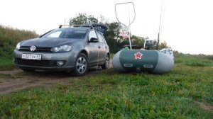 Перевозка лодки на крыше.