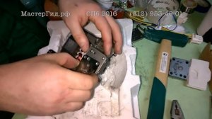 Разобранный компрессор холодильника