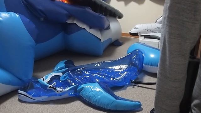 Inflatable dolphin ride to deflate