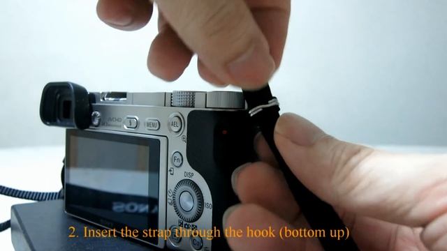 Sony A6000/A5100 - How to attach shoulder strap смотреть онлайн
