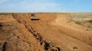 Разработка грунта c  перемещением до 50 метров ДТ 75