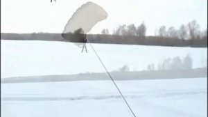 a snowmobile towing a parachute. Fly even children. Парашют буксируемый снегоходом .