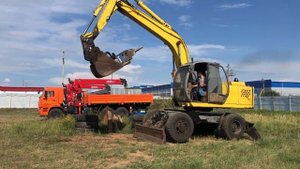 Работа экскаватора ЕК-14 после замены главного насоса.