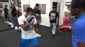 Floyd Mayweather Sr. padwork with Mickey Bey inside Mayweather Boxing Club