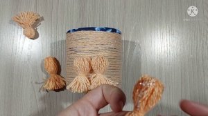 Детская поделка-карандашница из остатков пряжи