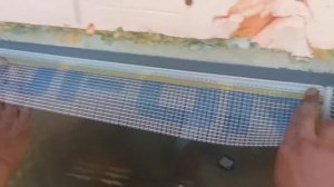 EIFS, установка элемента примыкания с сеткой на верхний оконный откос