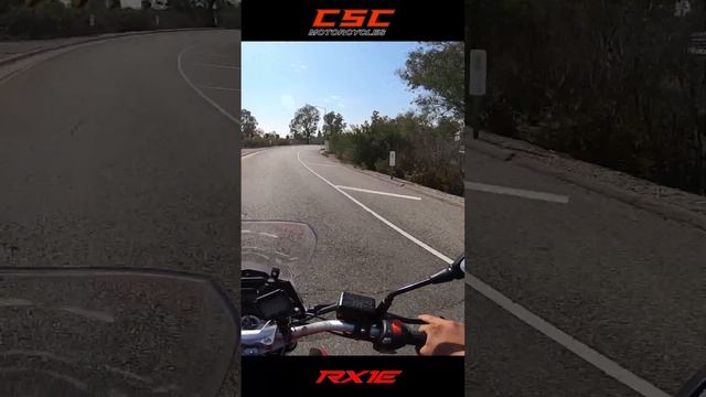 How does the RX1E electric motorcycle ride on the freeway?