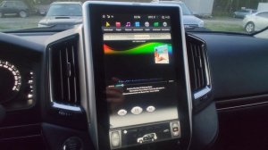 Отзыв о магнитоле в Тесла стиле установленной на Toyota Land cruiser 200.