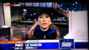 Storm Mongo behind Fox 5 Reporter