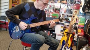 Playing an Ibanez GRX70QA electric guitar
