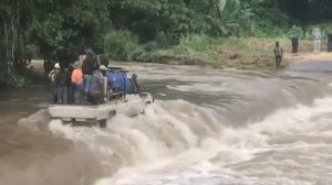 Seing is Believing - a Toyota Land Cruiser 79 SC crossing a flooded river in Bougainville