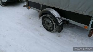 Перевозка снегохода в прицепе.
