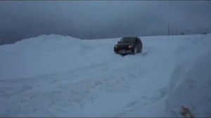 Киа Соренто на цепях по снегу