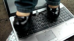 132  black heels crushing netbook