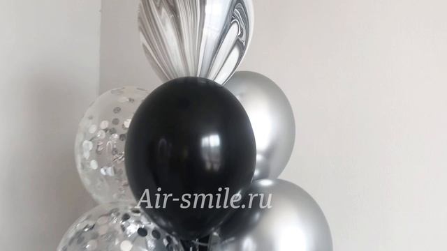 Фонтан из шаров черного цвета с агатами и конфетти