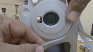 How to attach hand strap and cover to fujifilm instaxmini9