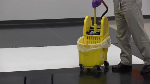 Applying Floor Finish using a mop and bucket смотреть онлайн