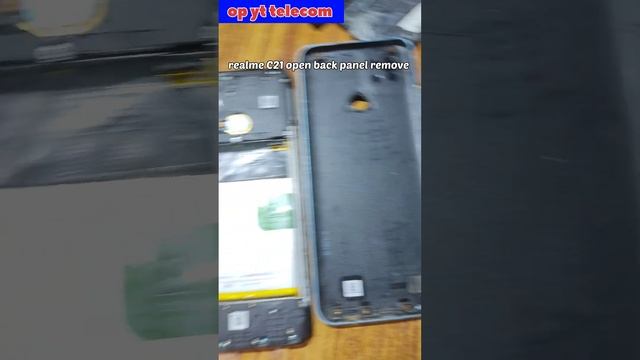 realme C21 open back panel remove #shortsvideo @opyttelecommobilerepairing