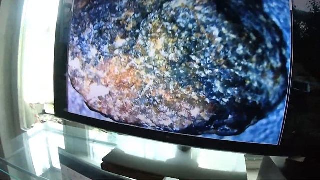 Метеорит, взятый Металлоискателем GTX5030 рассматриваем через USB микроскоп