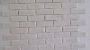 Монтаж гипсовой плитки под кирпич, камень