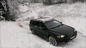 Volvo XC70 offroad. Winter AWD test. Winter drive uphill.