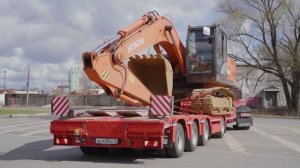 Перевозка негабаритной строительной техники на полуприцепе Тверьстроймаш