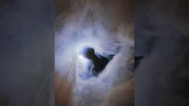 Туманность NGC 1999, которая внешне чем-то напоминает гиганскую замочную скважину в небе. смотреть онлайн