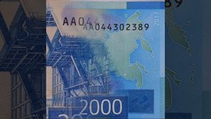 Скрытые знаки на купюре 2000 рублей