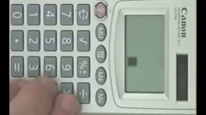 Игра в Tetris на калькуляторе Canon.