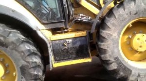 Погрузчик экскаватор CAT 434F в работе