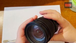 Отмачиваем резинку на объективе