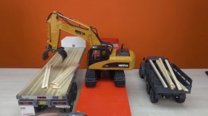 Загружаем Урал 4320 с помощью экскаватора на радиоуправлении Huina 1570