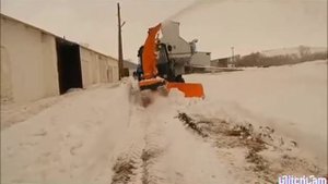 Уборка снегом шнекоротором