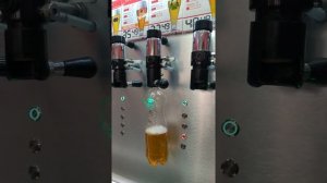Автоматический налив пива в ПЭТ бутылки.