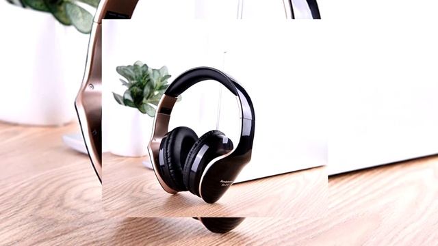 Стильные беспроводные наушники Ssmarwear с Алиэкспресс. FM-радио, Bluetooth 4.0, microSD. смотреть онлайн