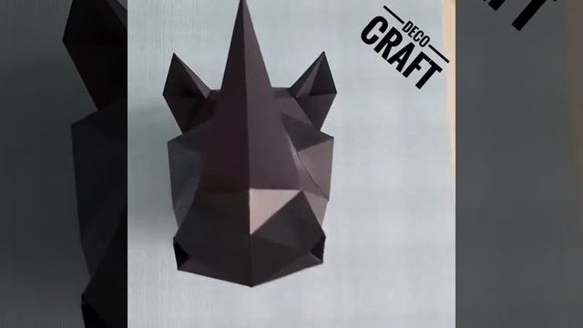 Полигональная фигура из бумаги: носорог