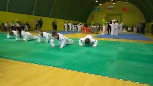 Тхэквондо аттестация бело-желтый пояс