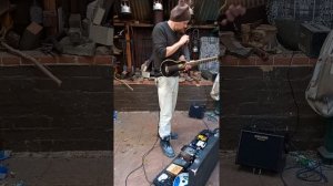 Improvised loop jam with my busking setup. Washburn Rover travel guitar with foot percussion pedals