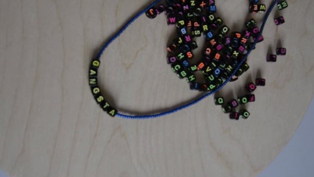 Украшение из бисера с надписью