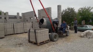 Бетономешалка самоходная с краном