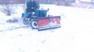 трактор из кпп заз.чистка снега