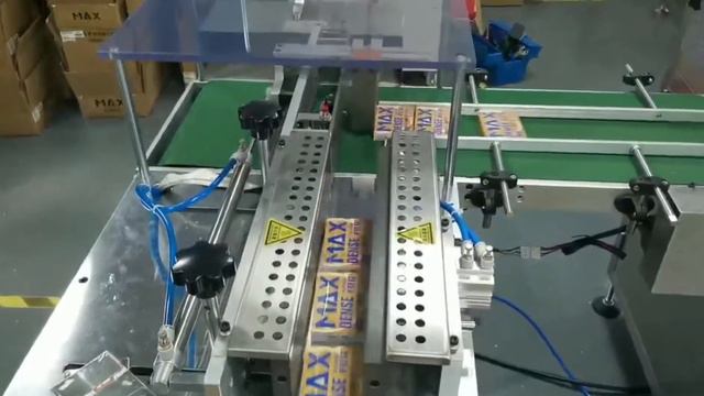 Automatic film wrapping machine for electronic vaporized smoke_NUBER automation_Packing equipment