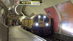 London Underground Battery Locomotives L46 and L48 passing Notting Hill Gate