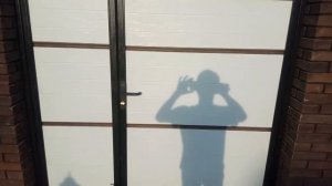 Секционные ворота Алютех и калитка в стиле ворот