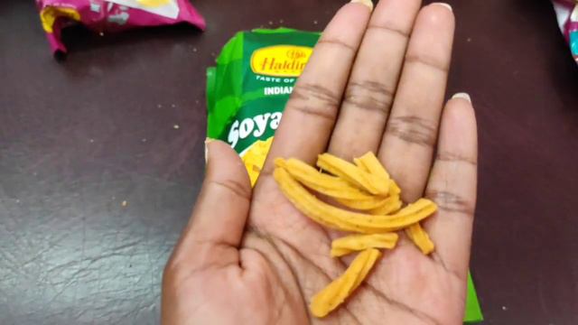 Trying and eating indian Haldiram snacks food subscription box